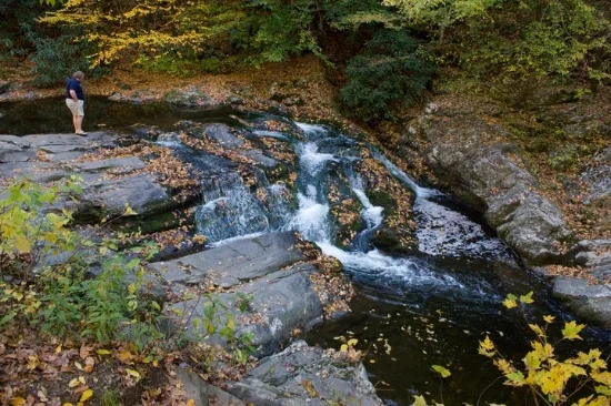 Todd at one of many scenic waterfalls in the park.