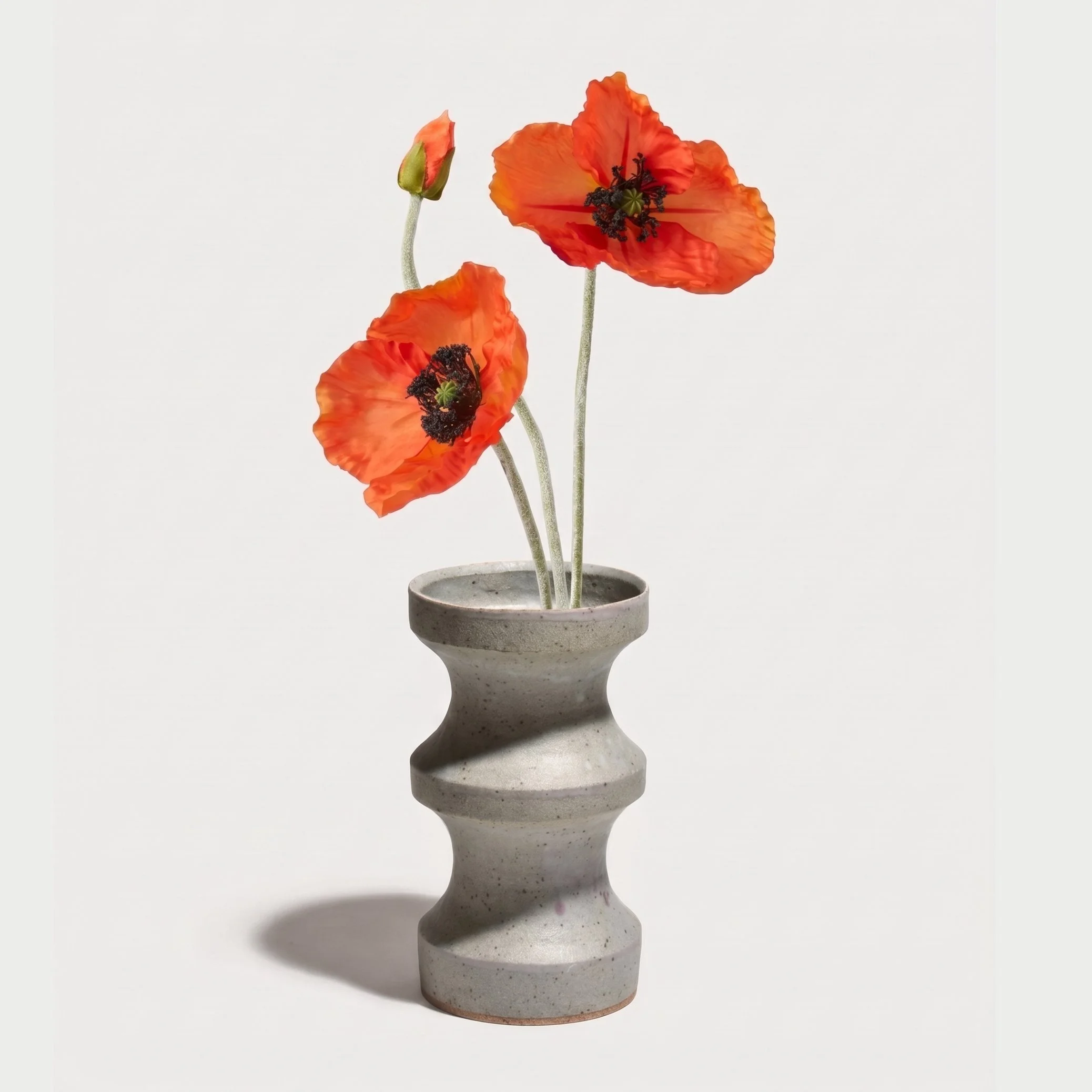 Adding_red_poppies_to_vase_2K_20261022063706.jpg