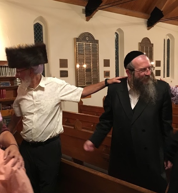 A Welcome Visitor sharing his shtreimel