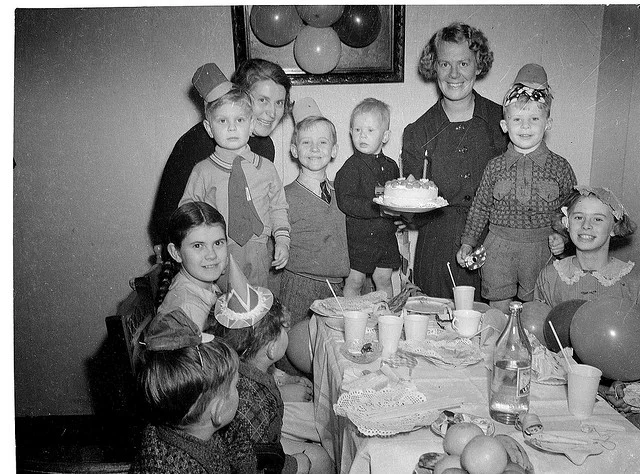 Blowing out candles, making wishes.