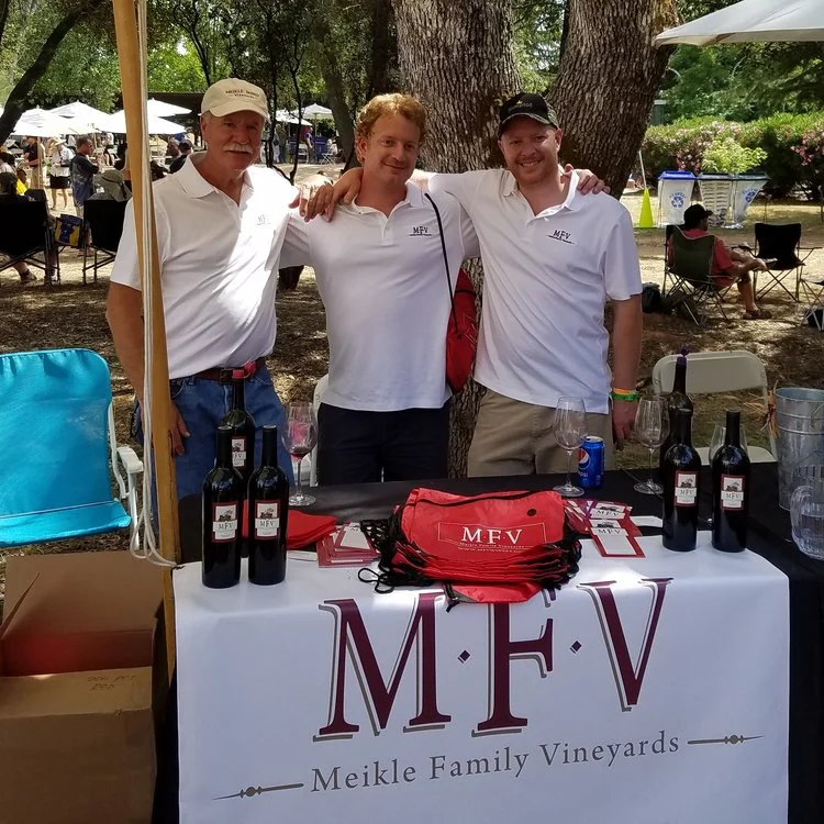 Jeff Meikle, far left, with sons Jamison Meikle (the winemaker, middle) and Jonathon Meikle (far right)
