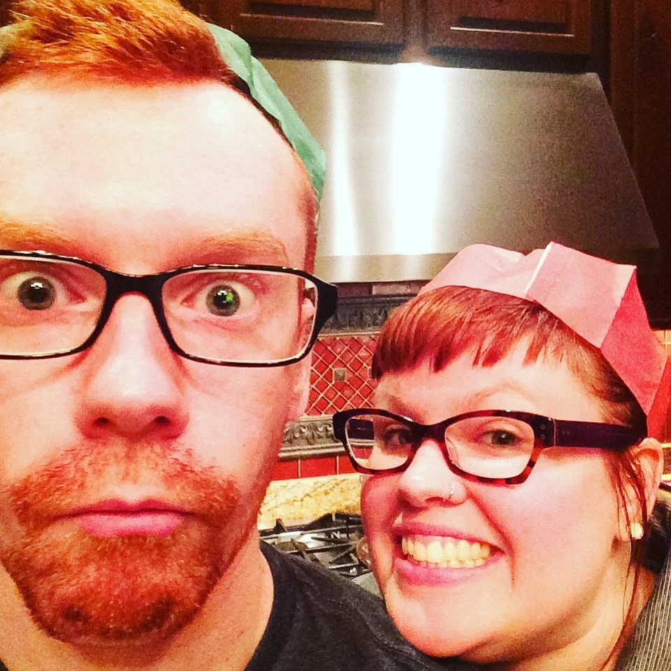 My brother and I celebrating in our charming paper hats