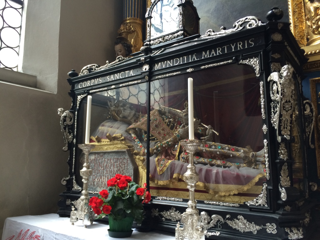 Sainte Munditia's bejeweled remains at St Peter's Cathedral. She is the patron saint of single women (so badass!).
