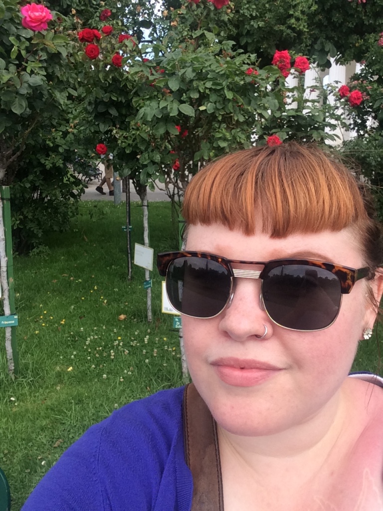 I took a self-guided walking tour that led me to the Volksgarten's rose garden. Also note the giant sunburn :-(