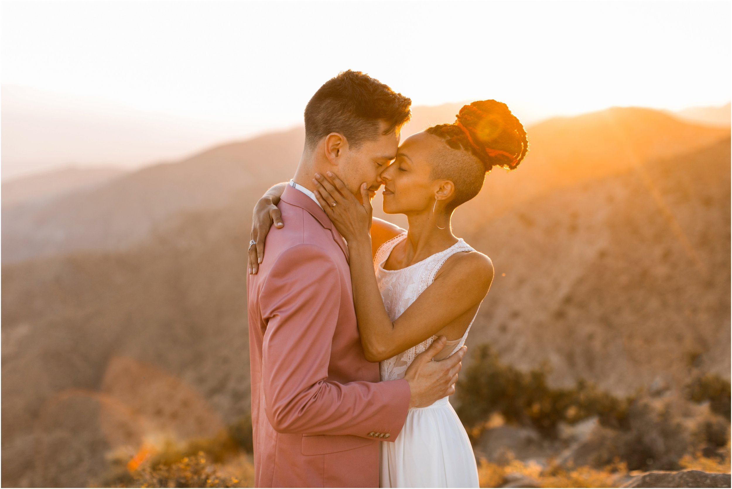 Joshua Tree Wedding, Joshua Tree Elopement, Joshua Tree Proposal, Joshua Tree National Park Wedding, Joshua Tree National Park Elopement, Elopement Photographer, Elopement ideas, Joshua Tree National Park, Joshua Tree, Desert engagement session, desert wedding ideas, Joshua Tree wedding venues, Desert elopement, Desert wedding, Boho bride, boho wedding, Mauve suit, mauve grooms suit, pink grooms suit, pink suit, coachella wedding, surprise proposal, Mandi Lynn Photo