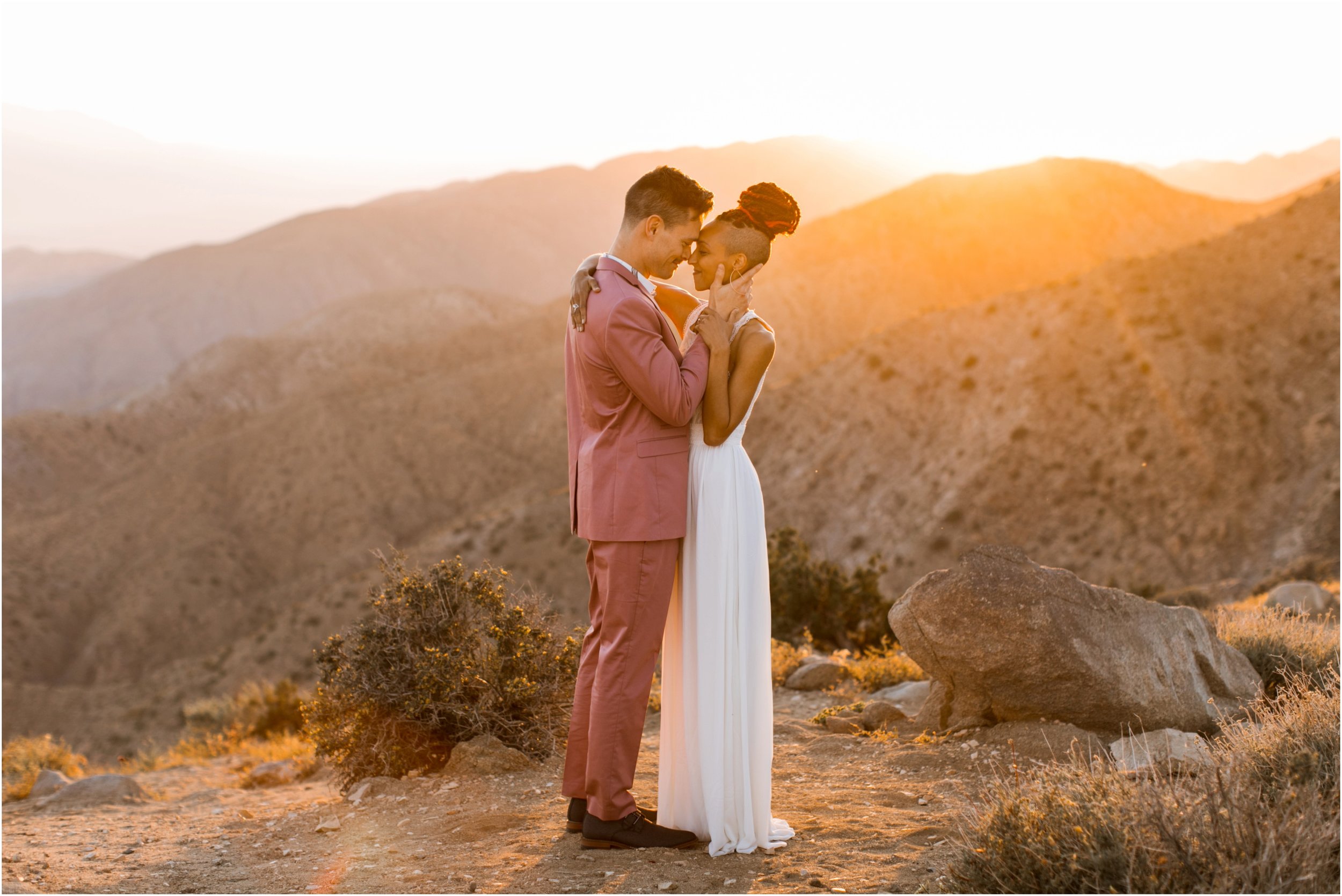 Joshua Tree Wedding, Joshua Tree Elopement, Joshua Tree Proposal, Joshua Tree National Park Wedding, Joshua Tree National Park Elopement, Elopement Photographer, Elopement ideas, Joshua Tree National Park, Joshua Tree, Desert engagement session, desert wedding ideas, Joshua Tree wedding venues, Desert elopement, Desert wedding, Boho bride, boho wedding, Mauve suit, mauve grooms suit, pink grooms suit, pink suit, coachella wedding, surprise proposal, Mandi Lynn Photo