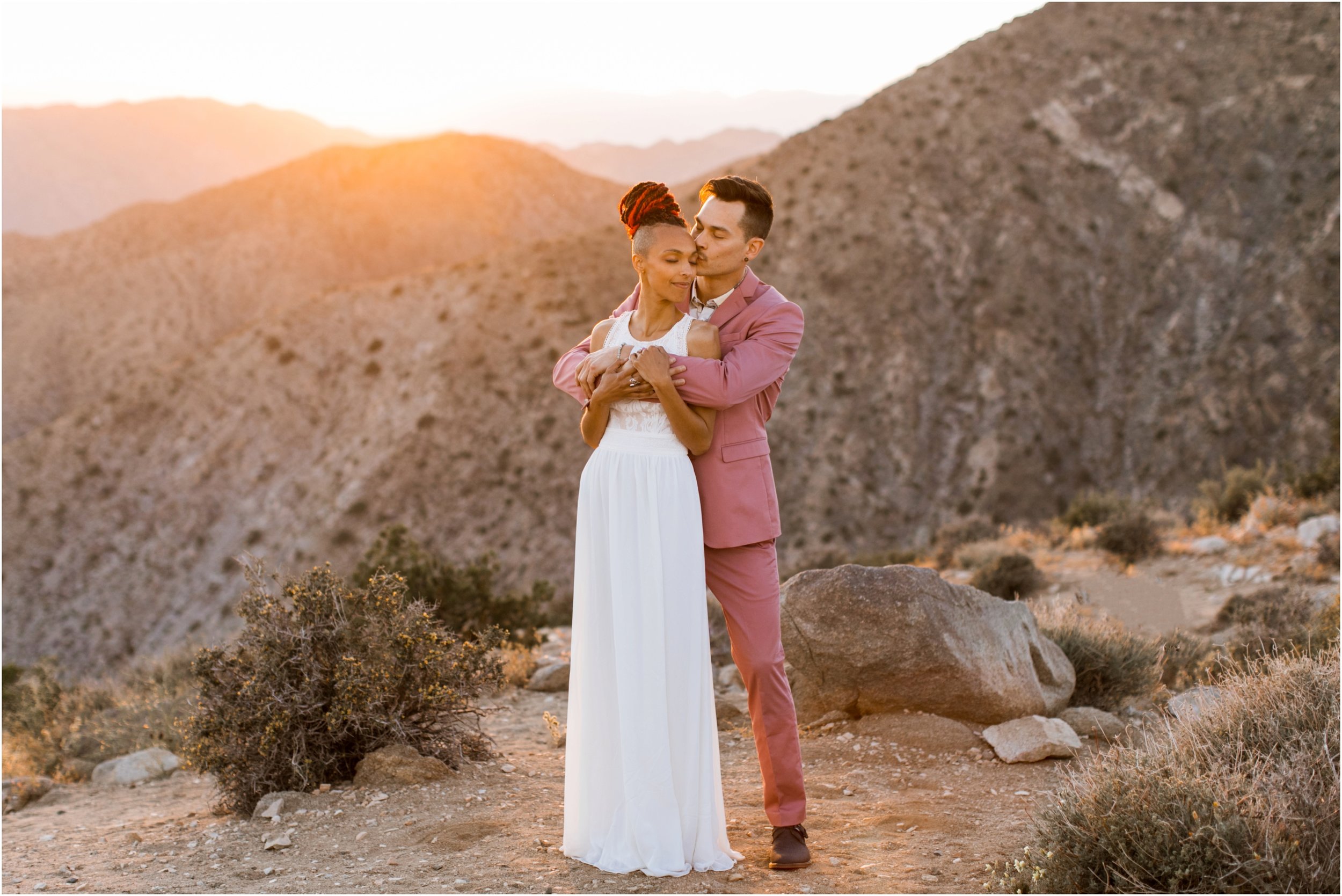 Joshua Tree Wedding, Joshua Tree Elopement, Joshua Tree Proposal, Joshua Tree National Park Wedding, Joshua Tree National Park Elopement, Elopement Photographer, Elopement ideas, Joshua Tree National Park, Joshua Tree, Desert engagement session, desert wedding ideas, Joshua Tree wedding venues, Desert elopement, Desert wedding, Boho bride, boho wedding, Mauve suit, mauve grooms suit, pink grooms suit, pink suit, coachella wedding, surprise proposal, Mandi Lynn Photo