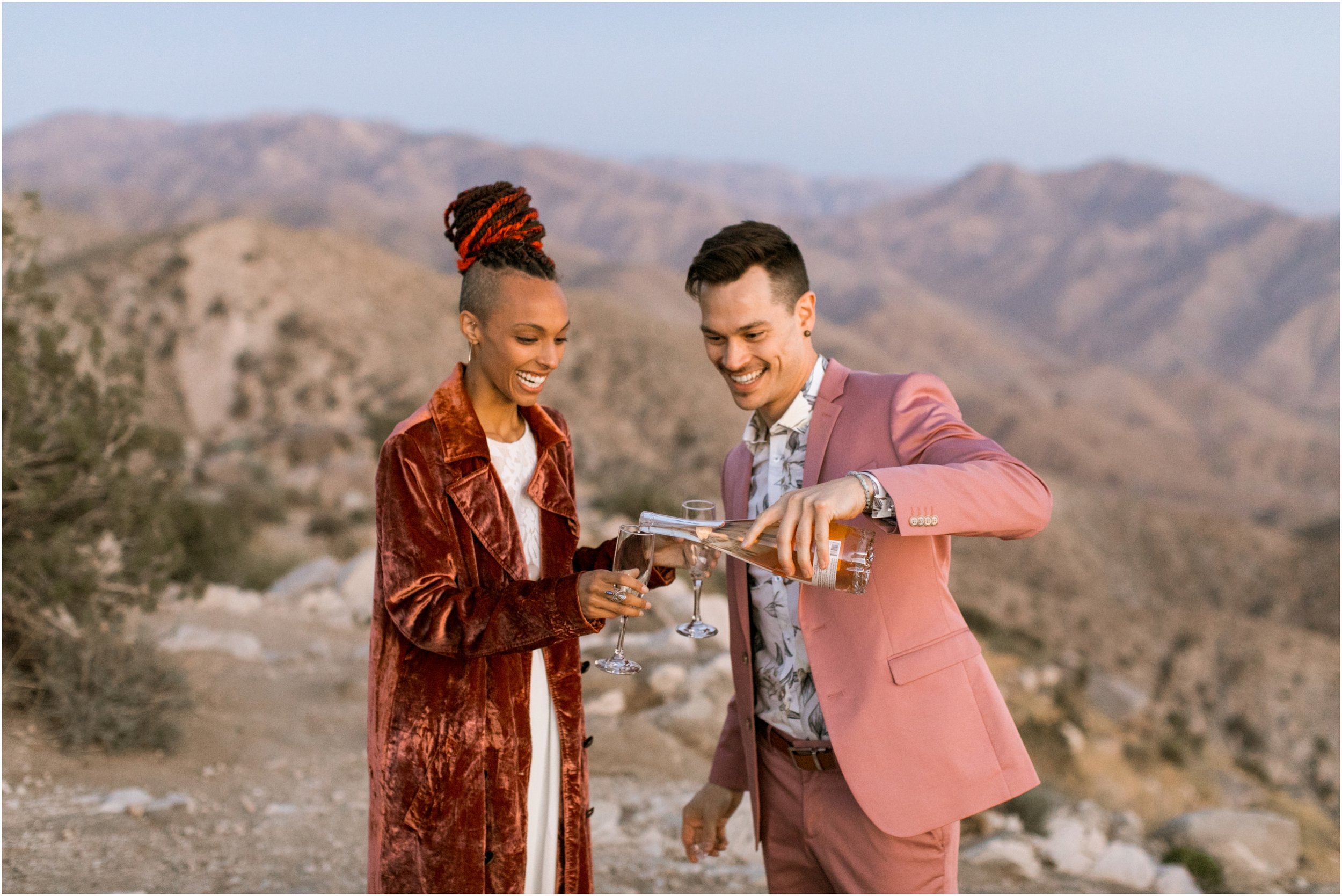 Joshua Tree Wedding, Joshua Tree Elopement, Joshua Tree Proposal, Joshua Tree National Park Wedding, Joshua Tree National Park Elopement, Elopement Photographer, Elopement ideas, Joshua Tree National Park, Joshua Tree, Desert engagement session, desert wedding ideas, Joshua Tree wedding venues, Desert elopement, Desert wedding, Boho bride, boho wedding, Mauve suit, mauve grooms suit, pink grooms suit, pink suit, coachella wedding, surprise proposal, Mandi Lynn Photo