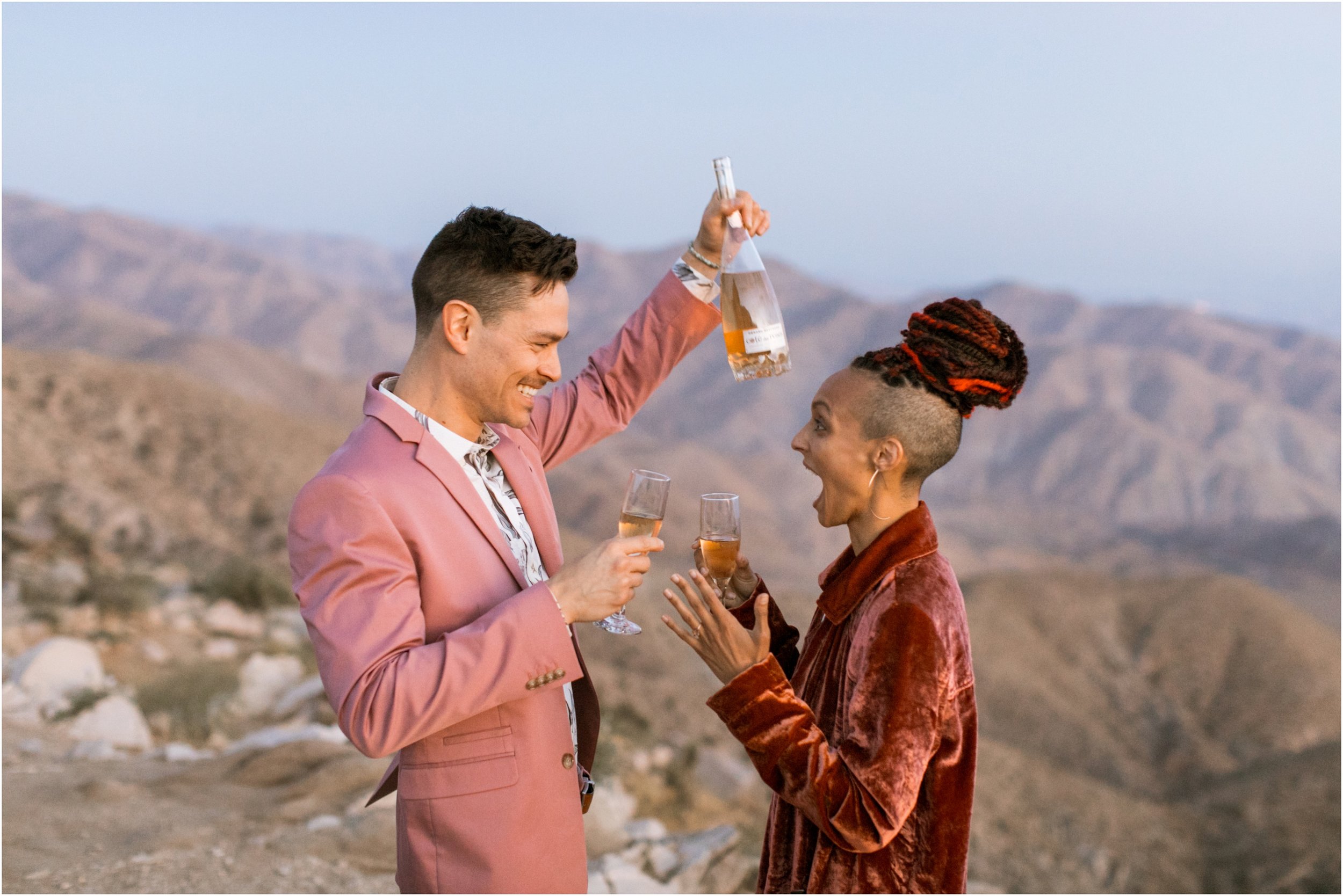 Joshua Tree Wedding, Joshua Tree Elopement, Joshua Tree Proposal, Joshua Tree National Park Wedding, Joshua Tree National Park Elopement, Elopement Photographer, Elopement ideas, Joshua Tree National Park, Joshua Tree, Desert engagement session, desert wedding ideas, Joshua Tree wedding venues, Desert elopement, Desert wedding, Boho bride, boho wedding, Mauve suit, mauve grooms suit, pink grooms suit, pink suit, coachella wedding, surprise proposal, Mandi Lynn Photo