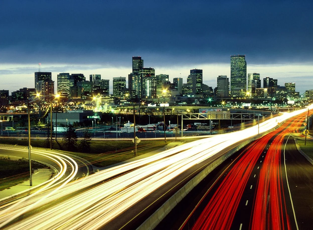 Car lights moving around city.jpg