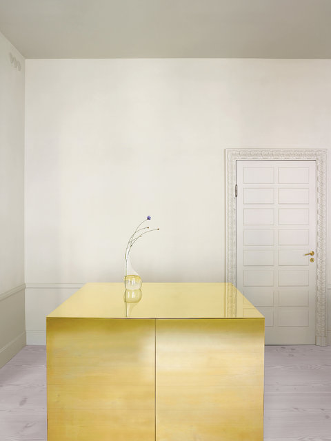 In the kitchen of a Stockholm apartment designed by the architects Claesson Koivisto Rune, a cabinet clad in brass functions as a work surface and a storage space. Credit Henry Bourne