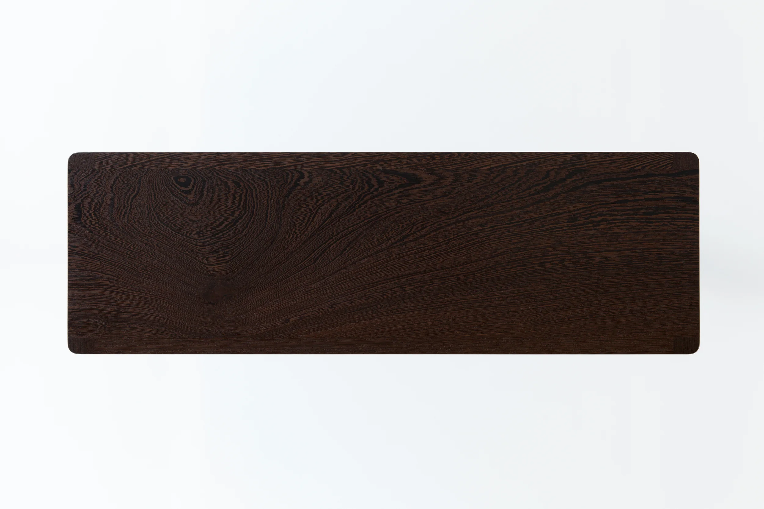  Modern timeless design executed with heirloom quality craftsmanship. Custom solid wood furniture tailor made in Brooklyn, New York by furniture designer Piet Houtenbos. Cobb Bookcase in solid black wenge. 