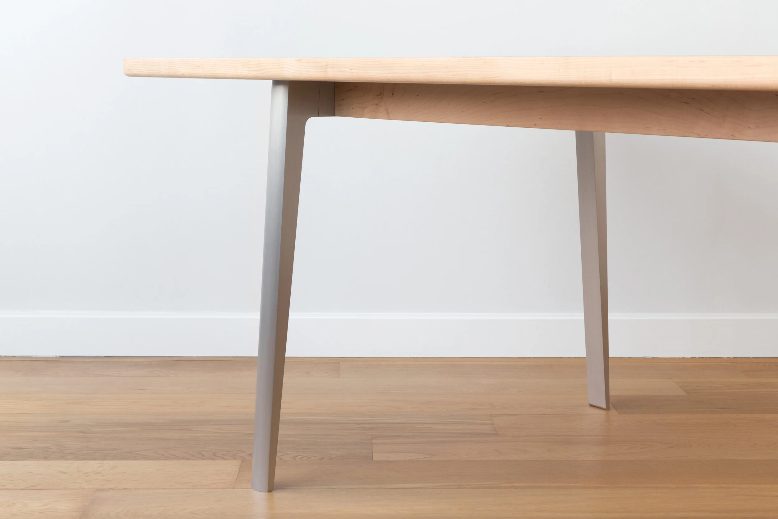 Silicon Seven Dining Table in Maple with Aluminum Legs