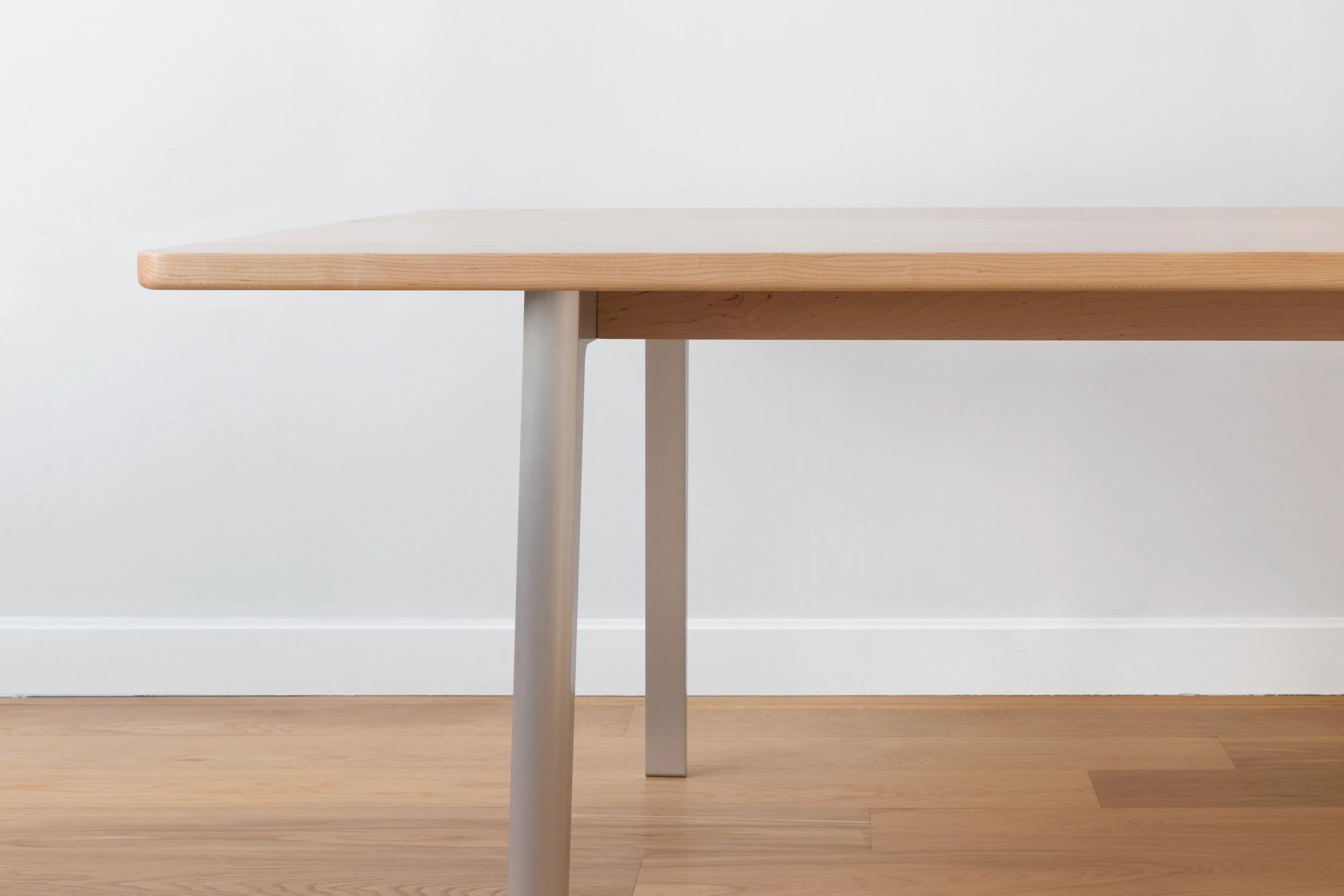 Silicon Seven Dining Table in Maple with Aluminum Legs