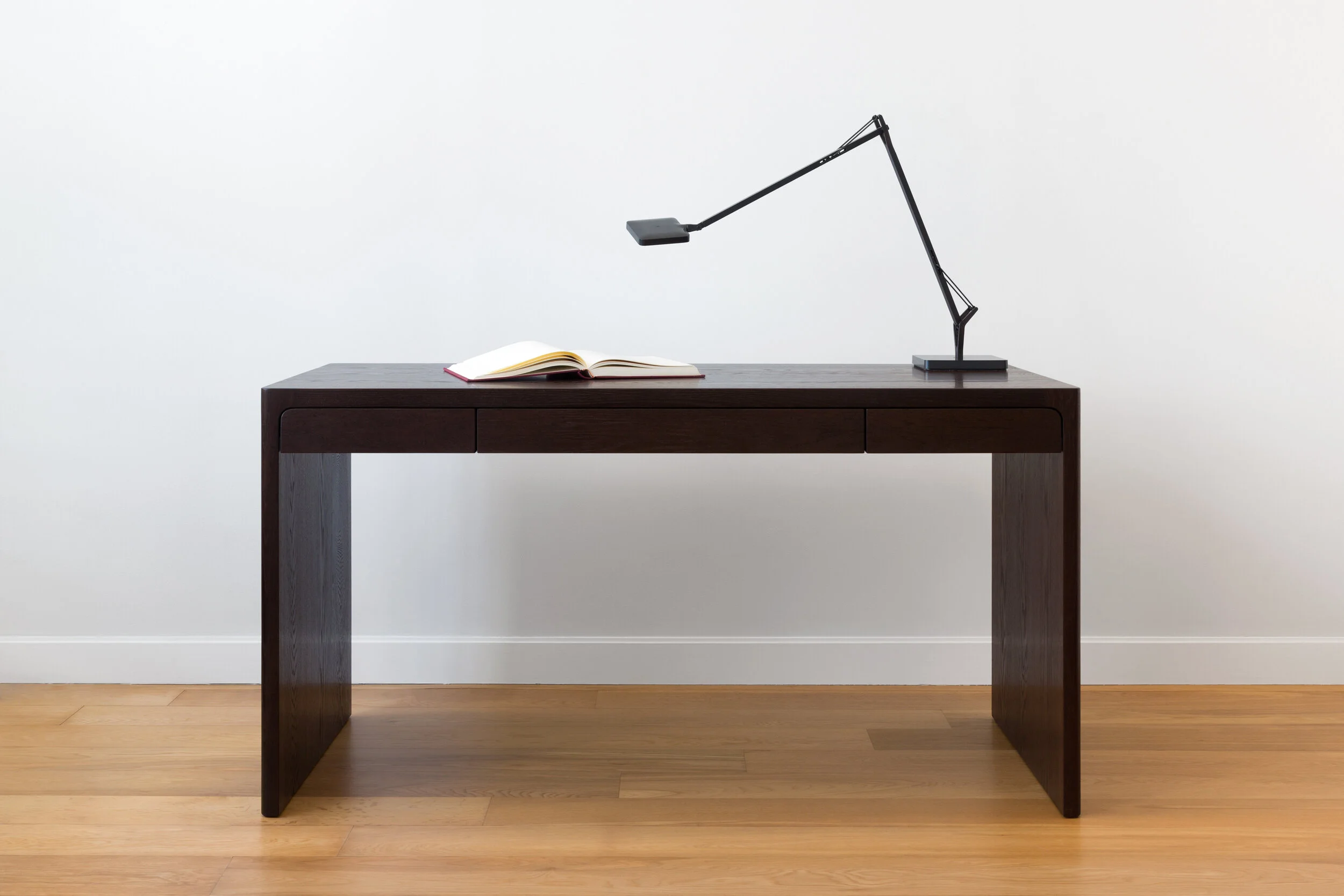 Fina Desk is Dark Oak with felt lined drawers