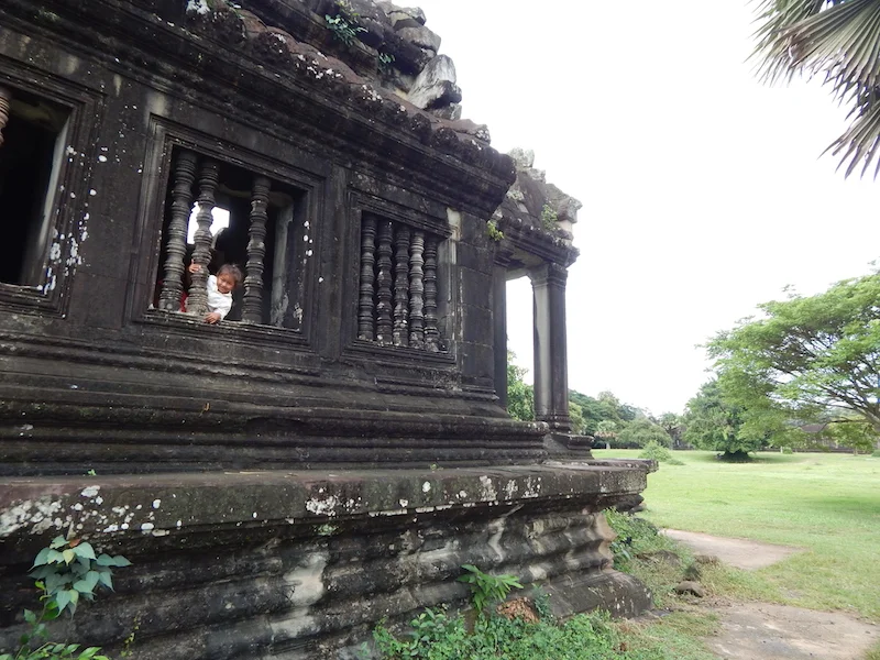 Angkor Wat has been an active place of worship since the original planning/construction in the 12th century. This little girl is the latest in a long line of generations to live in and around the temple complex.