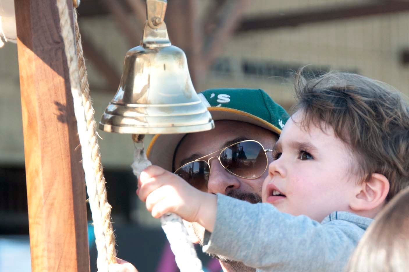 Kid ringing bell.jpg
