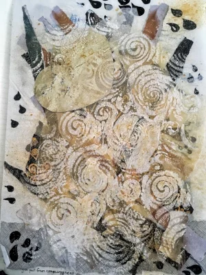 a plain background with writing hidden by a parchment flap. Pen embellishment, acrylic stenciling