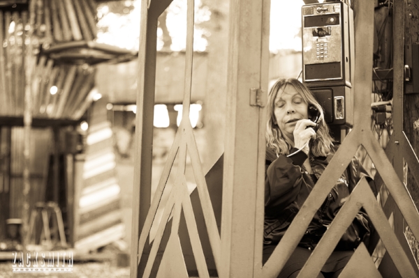 Rickie Lee Jones uses the pay phone on site to sing through it's dual spinning speakers...