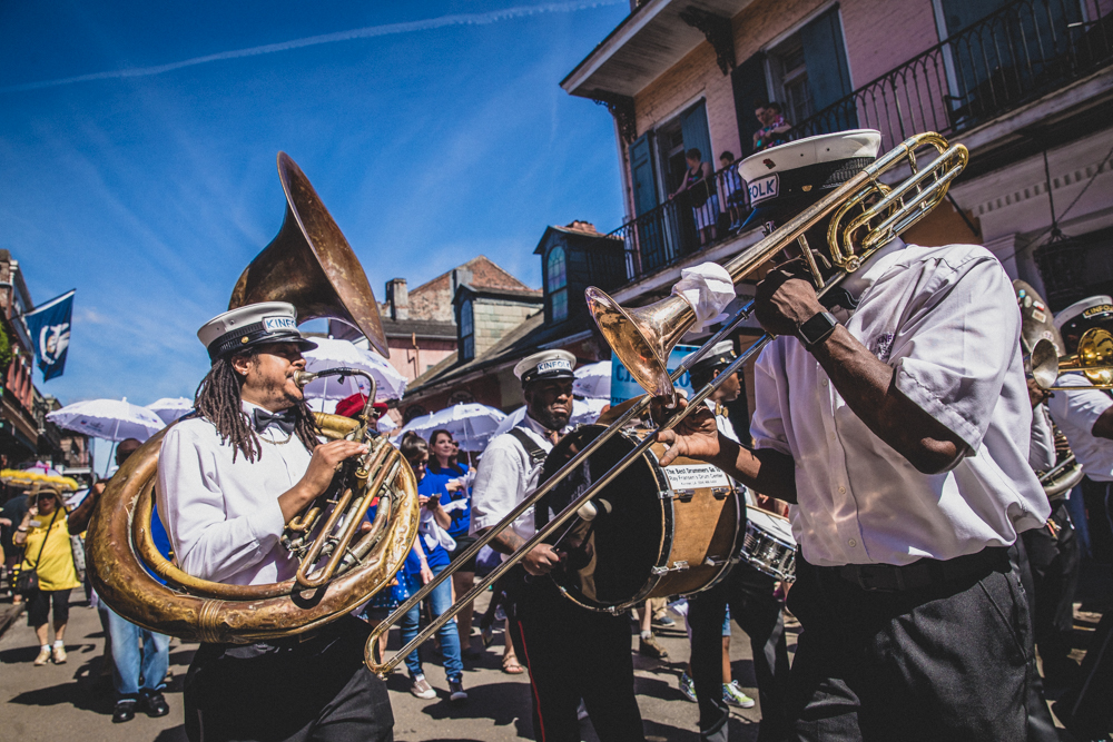 The Kinfolk Brass Band led the opening day Second Line to start the 36th Annual French Quarter Fest. ©Zack Smith Photography