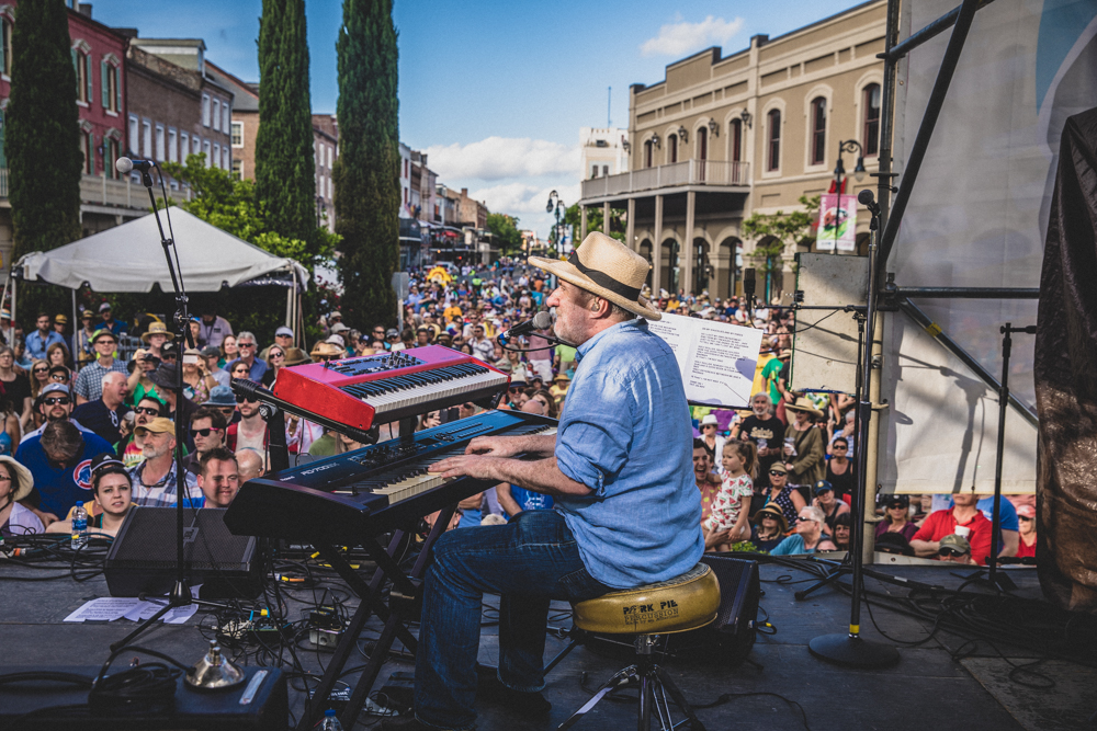 Jon Cleary plays to a packed French Quarter as he closes out Day One at the Chevron Stage. ©Zack Smith Photography