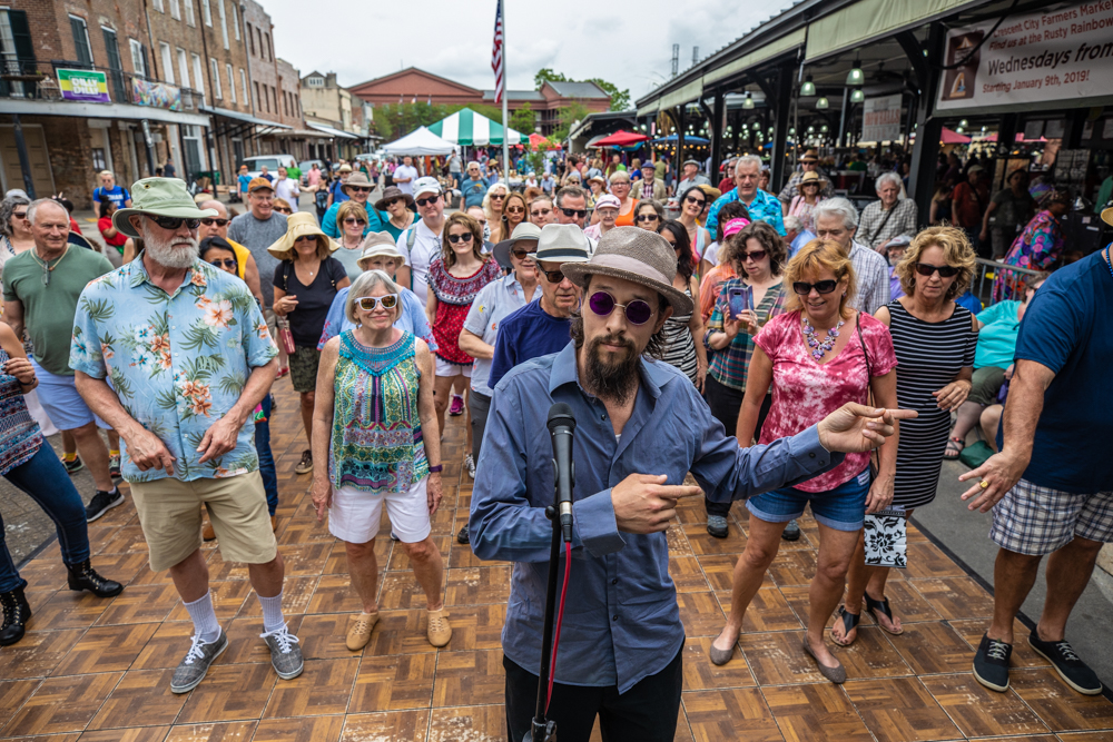 Chance Bushman of the NOLA Jitterbugs gives his daily swing dance lessons as he does so effortlessly! ©Zack Smith Photography