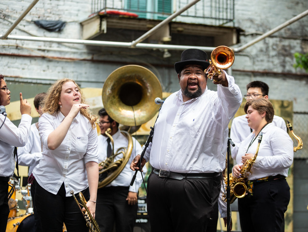 Trumpeter and bandleader Desmond Venable lead students and fire up the crowd. ©Zack Smith Photography