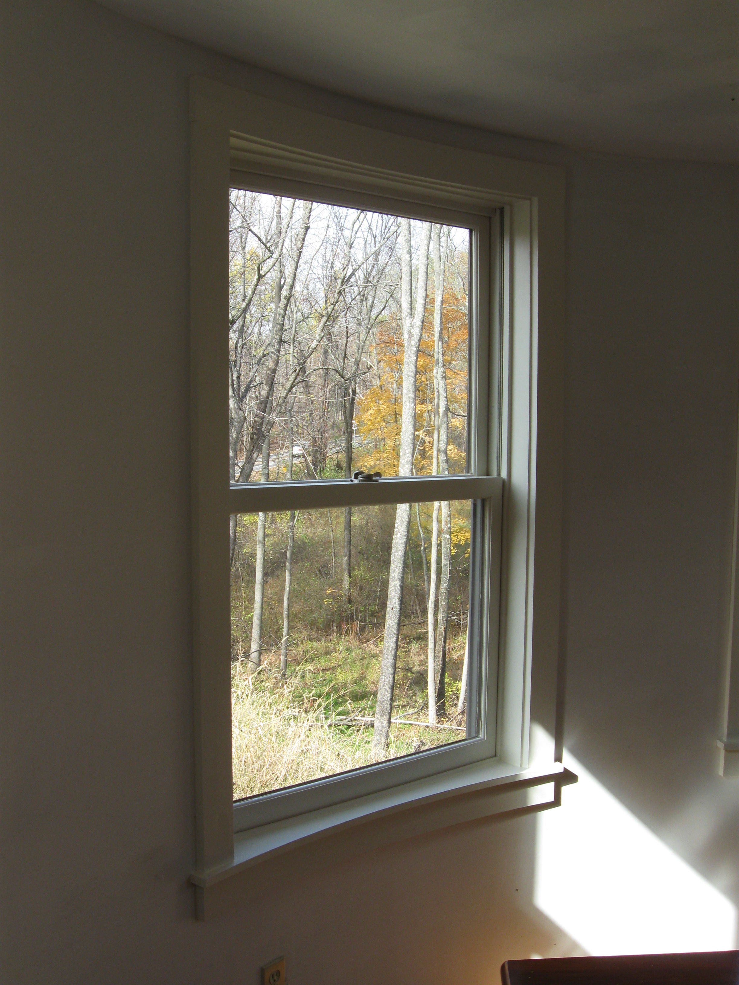  Window trimwork milled to match the curvature of the room. 
