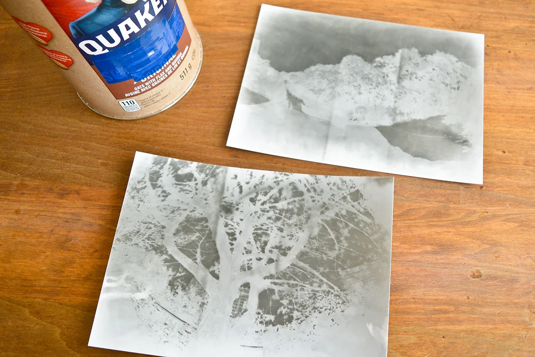 Paper negatives after they’ve been developed in a darkroom.