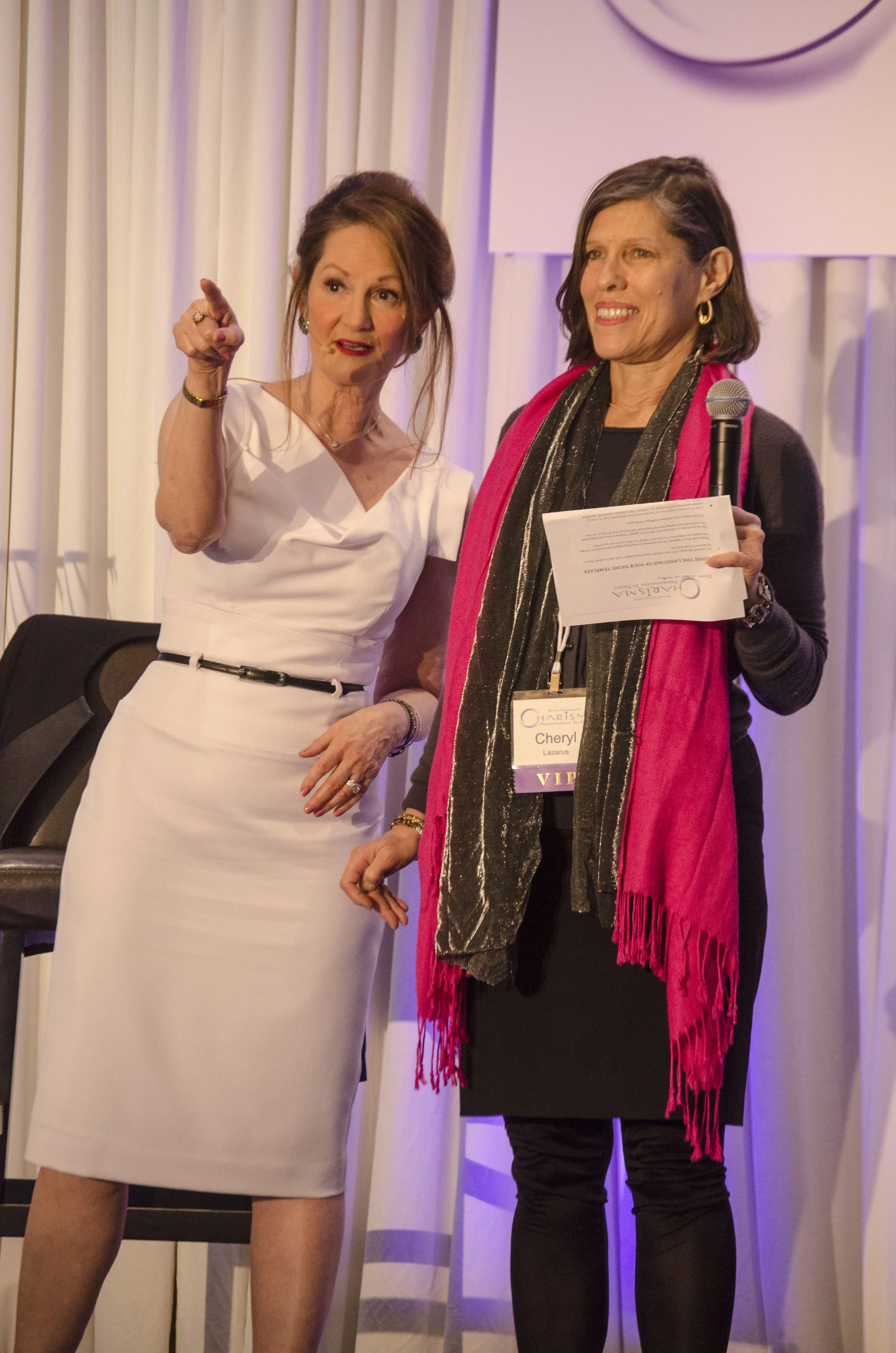Ruth coaching Cheryl Lazarus on how to look directly into the camera.