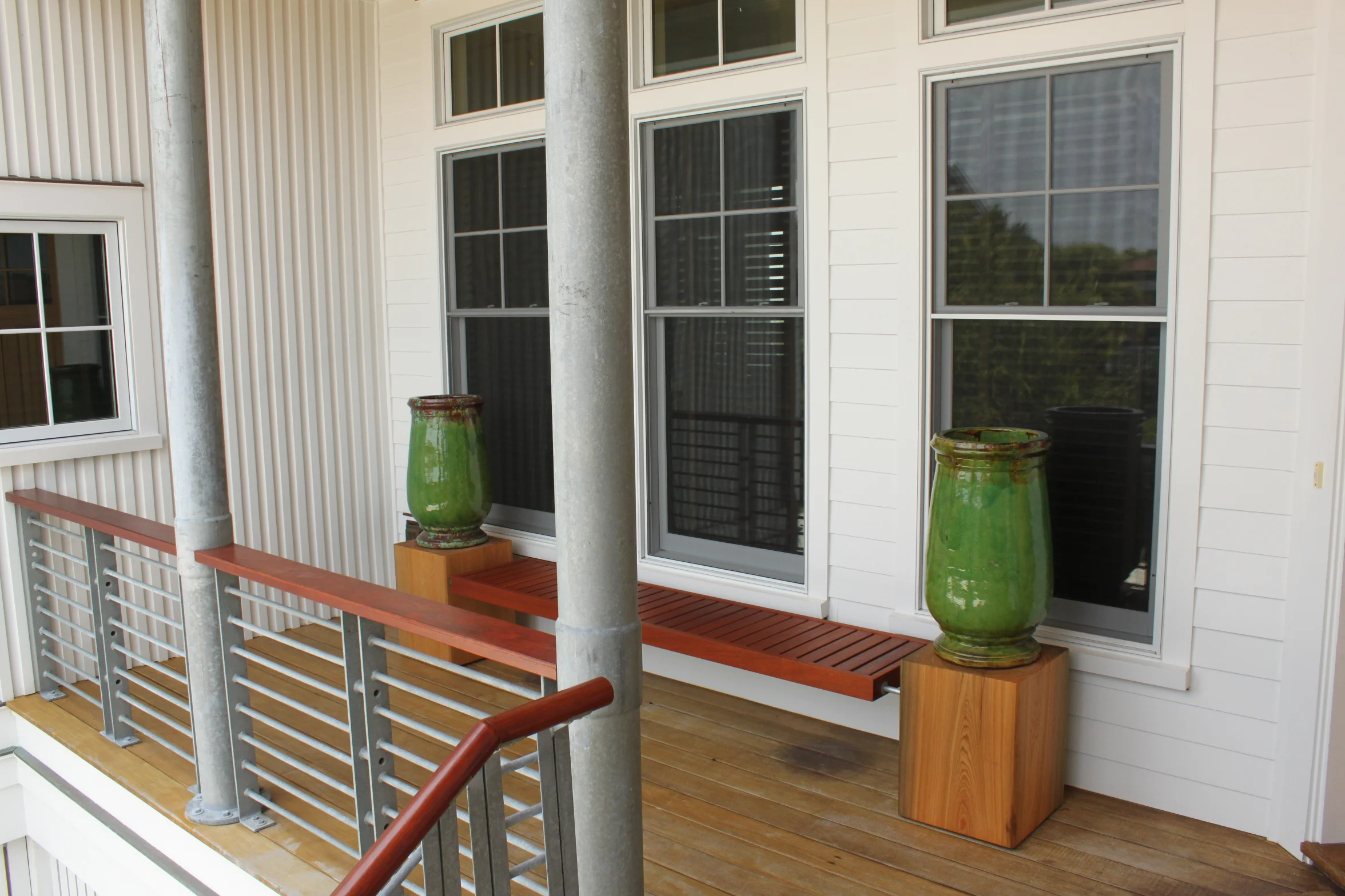  Bench and pot stand fabricated from Sapale, galvanized steel and river-recovered Bald Cypress end-cuts from a custom miller 