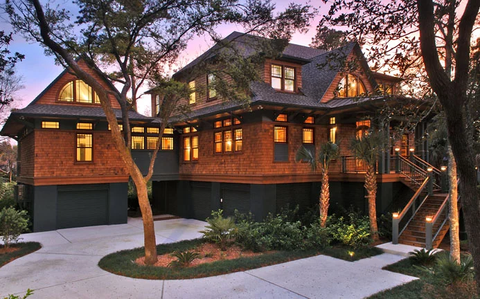  This craftsman-flavored residence is sited on a Kiawah Island lagoon with a golf fairway beyond. Oak interiors predominate in the craftsman tradition, while shingled siding and craftsman details distinguish the exterior. 