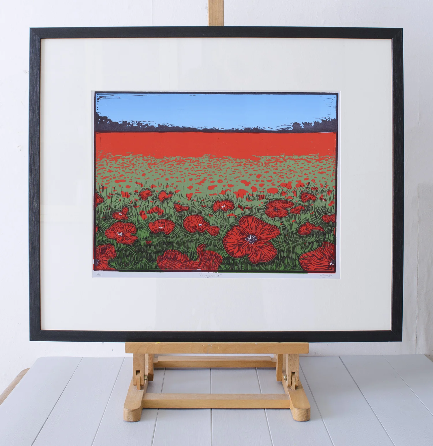 Poppyfield linocut on easel by Faisal Khouja.jpg