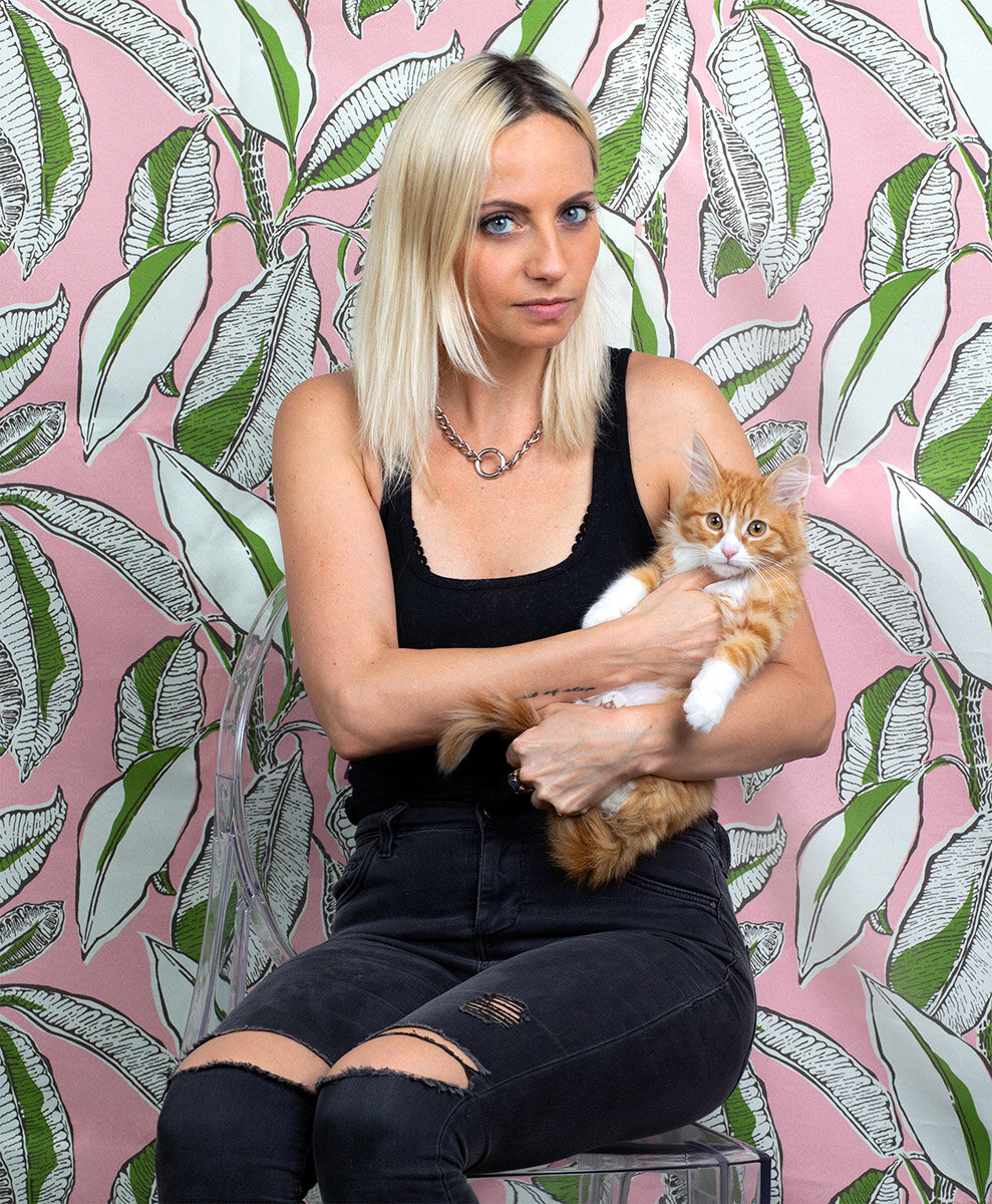 Kitten and woman portrait by Danielle Spires