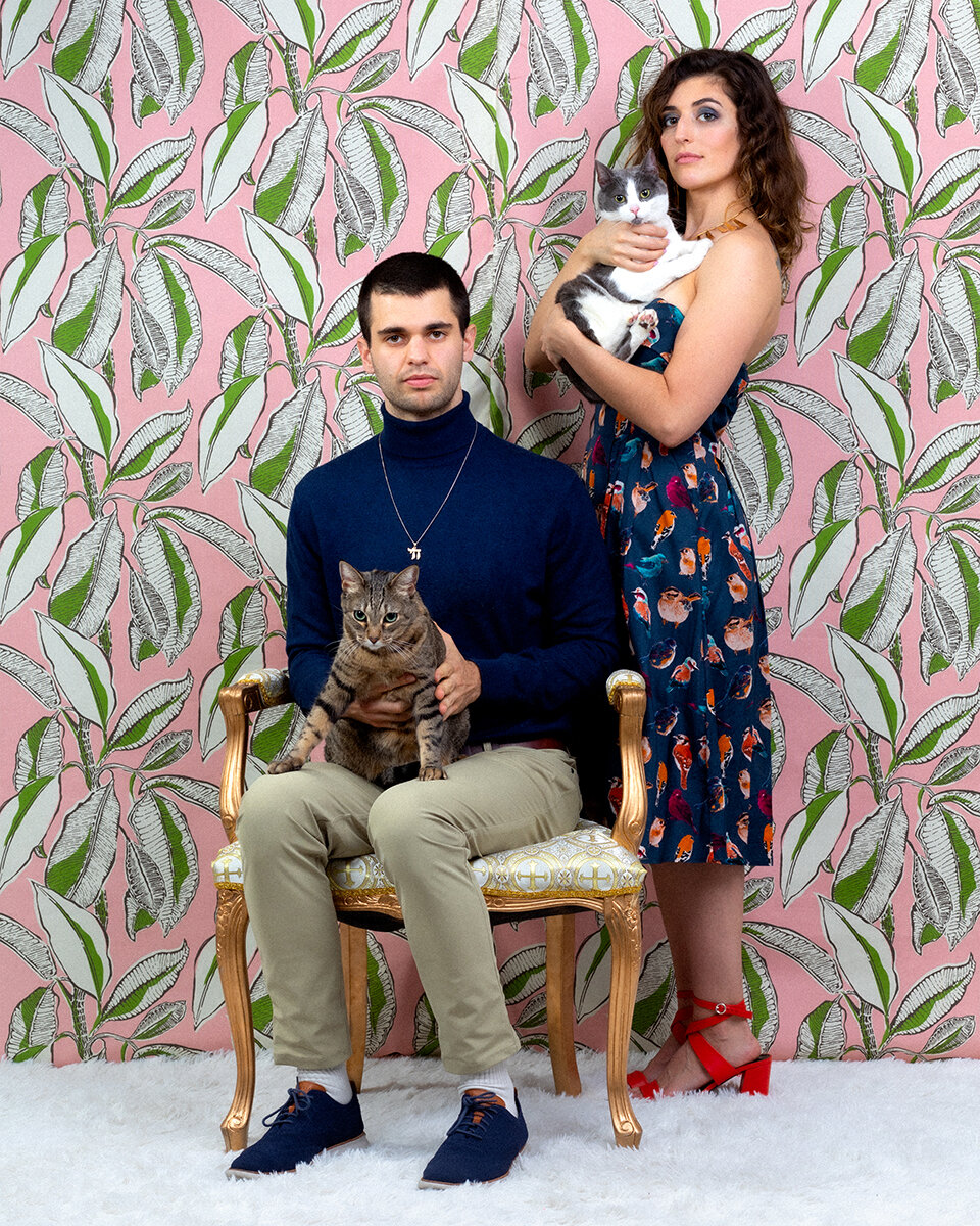 Couples family portrait with cats by Danielle Spires