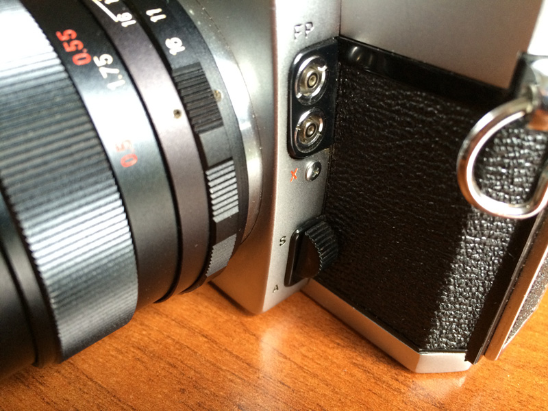You can instantly switch between Spot and Area metering through the lens with this switch on the 500DTL