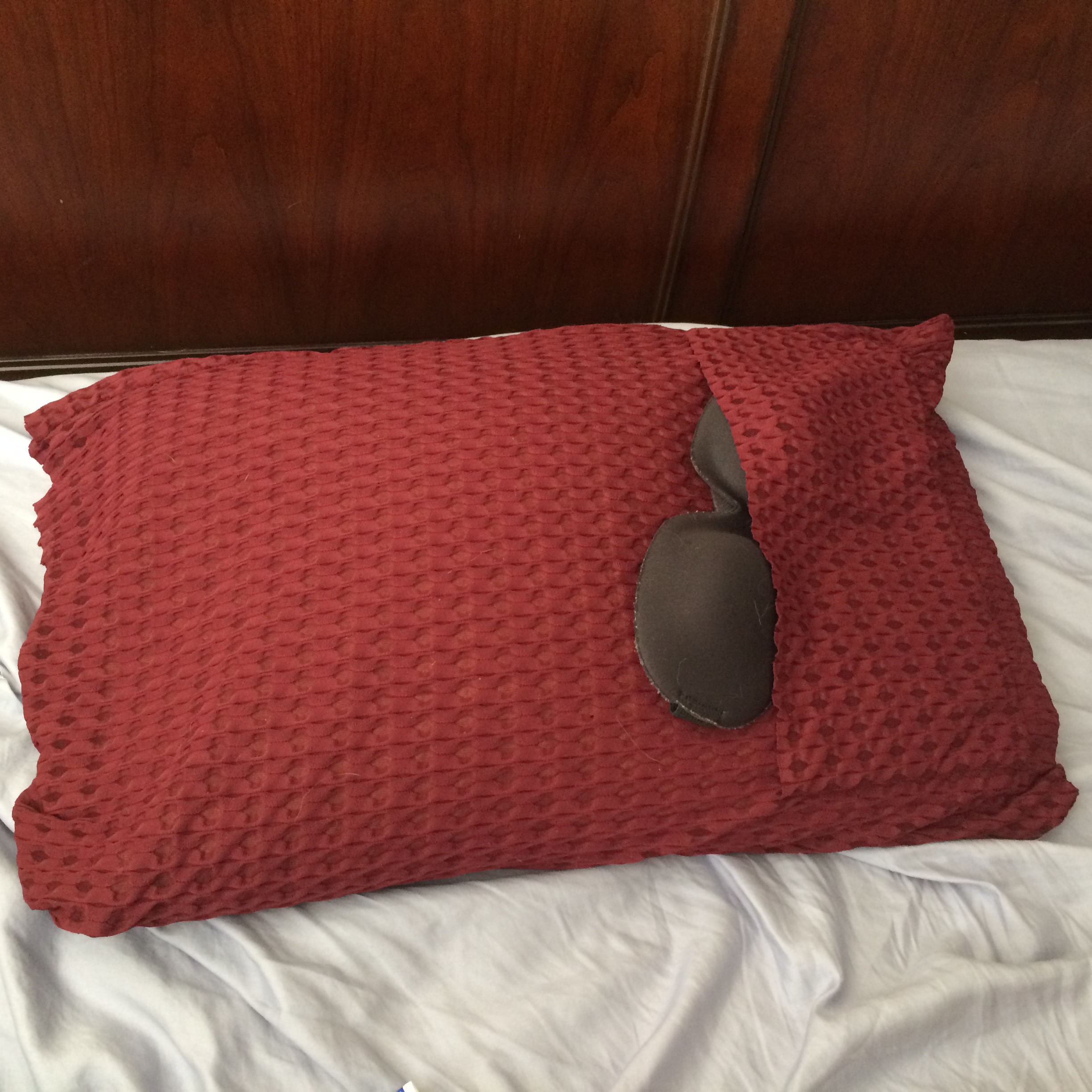 Pillow with sleeping mask pocket! I love the textured knit fabric I used, but it was kind of difficult for me to get it to sew properly. I'm going to save the rest of the fabric for another project once I'm a little better. 