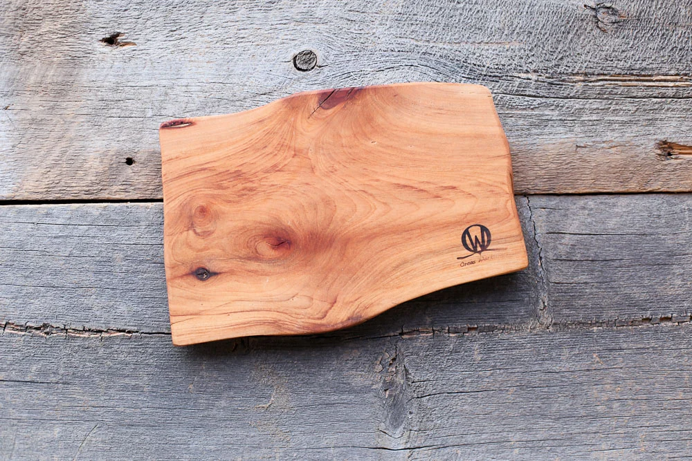 A handmade Orcas Workshop Cheese Board for serving up Valentine's night in. 