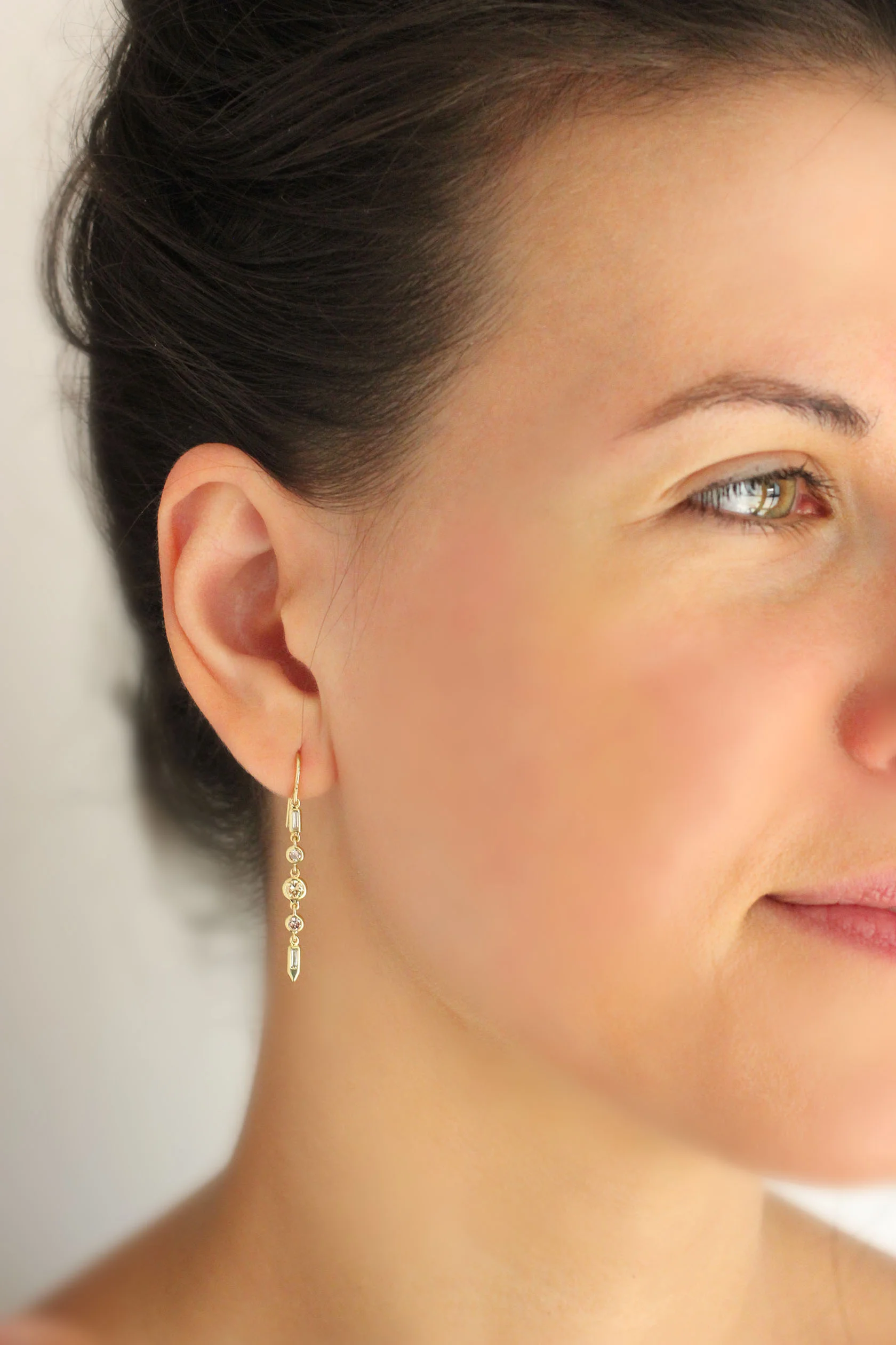 multi colo earrings on model 2.jpg