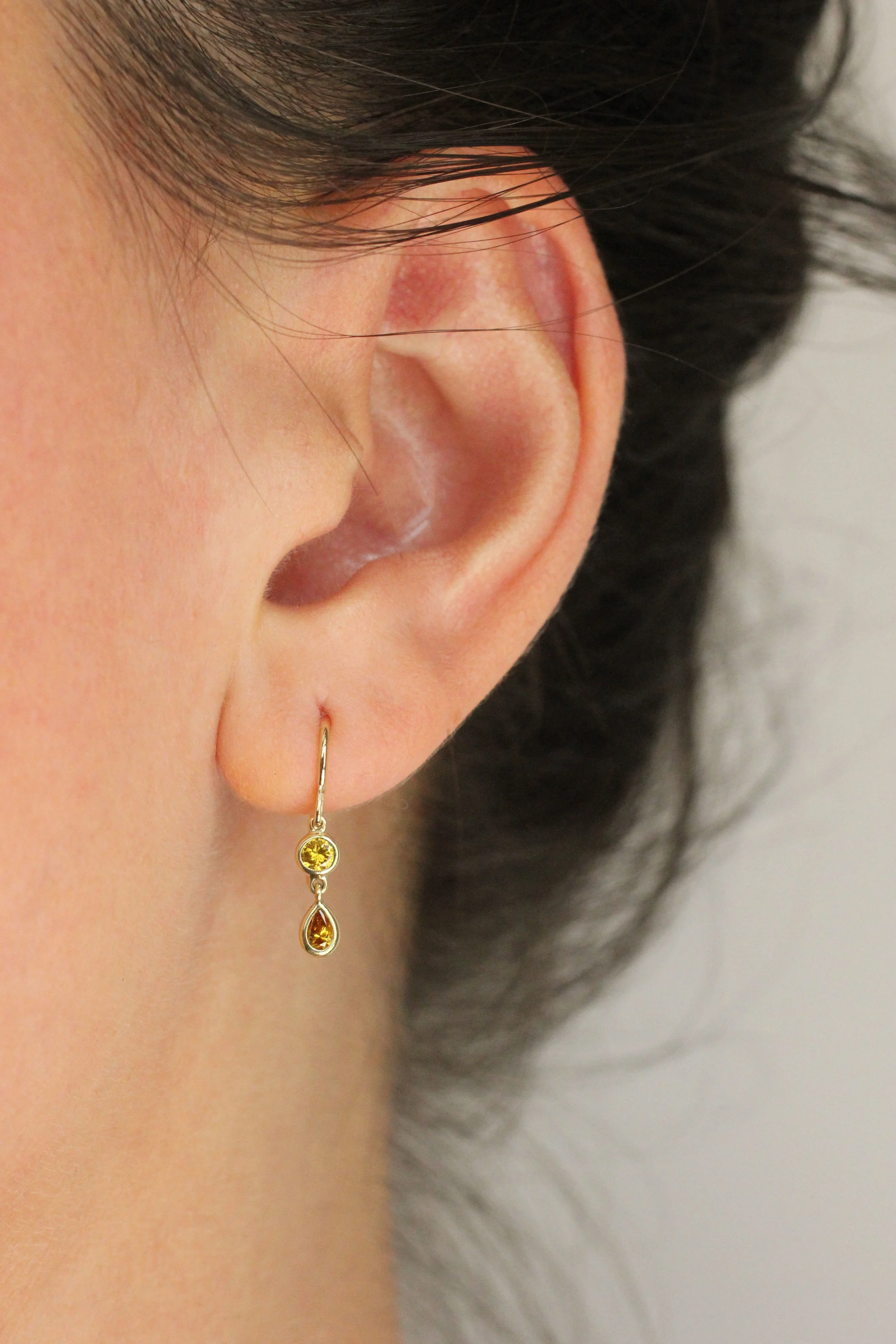 yeloow diamond shorties on ear.jpg