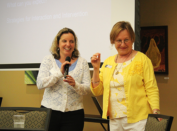 Dr. Gina Cosgrove of Campbell House Psychological Associates begins her talk about supporting children with Autism Spectrum Disorder after being introduced by Speech Language Pathologist Victoria Morrison.