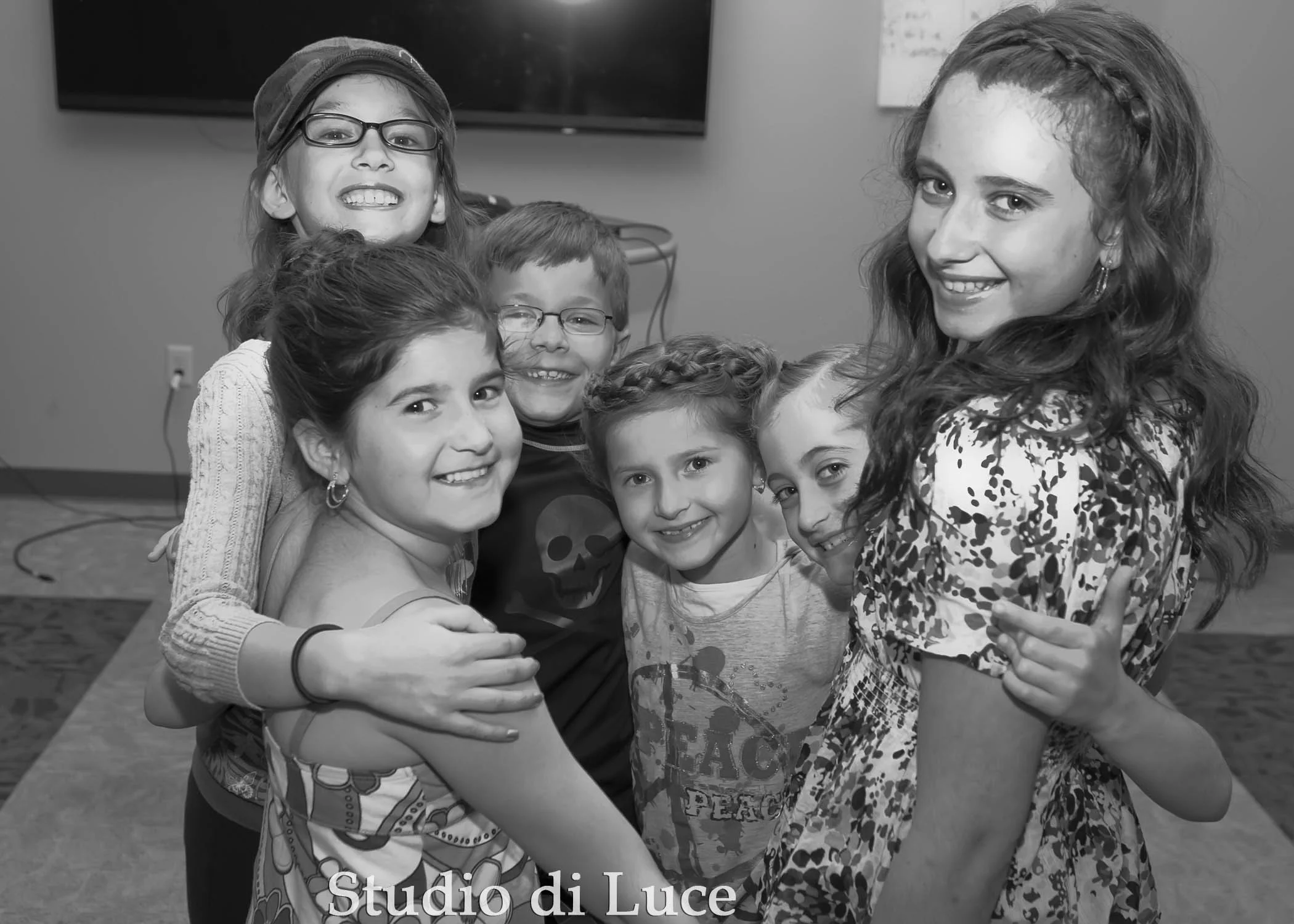 The child models hanging out backstage.