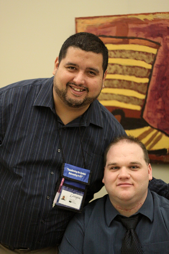 Outgoing President Victor welcomes newly elected President Andrew.