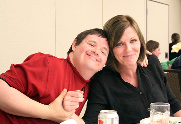Dennis and Stacy enjoy Flame's performance.