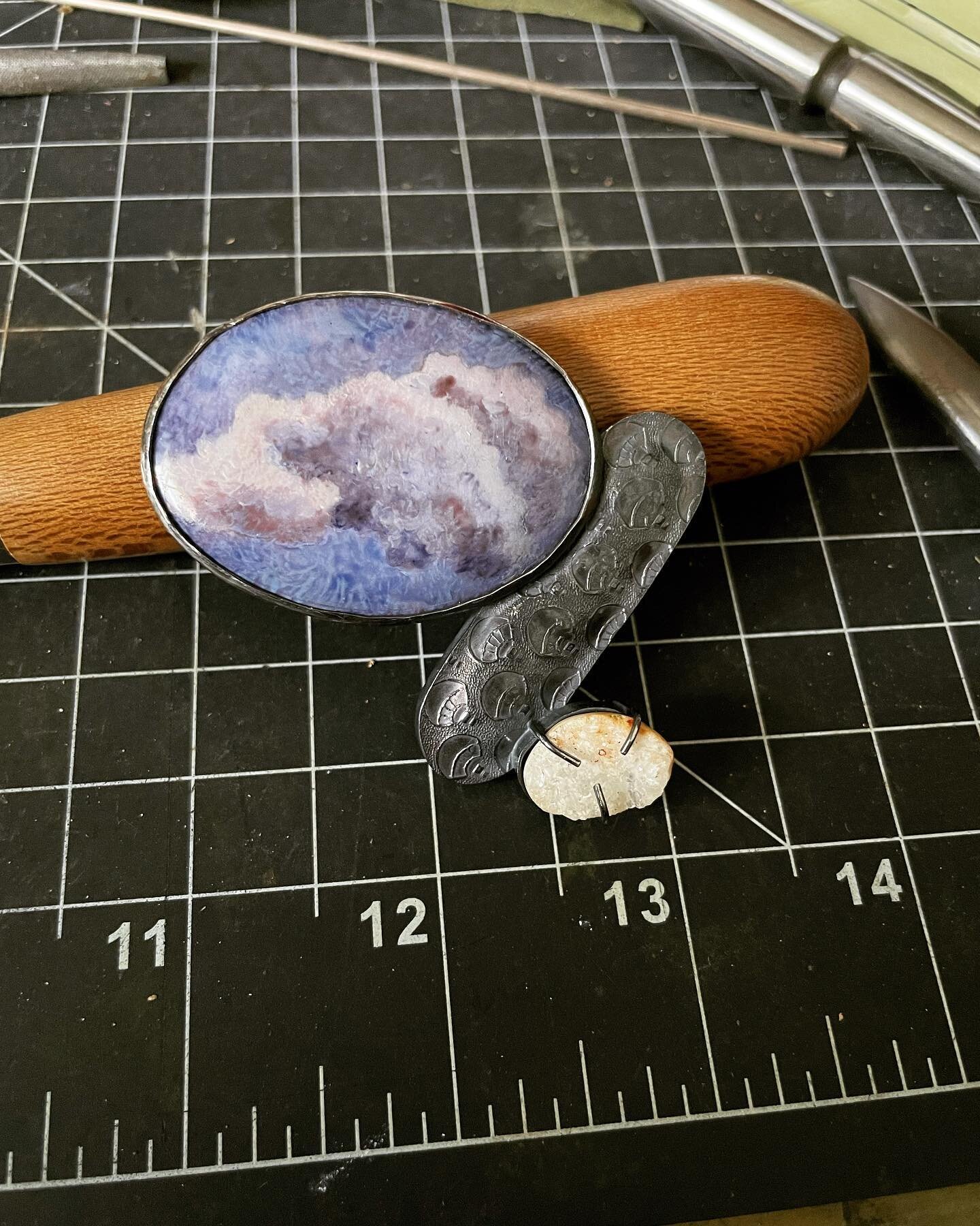 I am participating in a show on Saturday @factoryonfifth and here I am making weirdo brooches/bandanna slides (yes, this is both!!!) out of sterling silver, a handpainted enamel miniature of a cloud, and a cream druzy. 
Not earrings, rings, or neckla