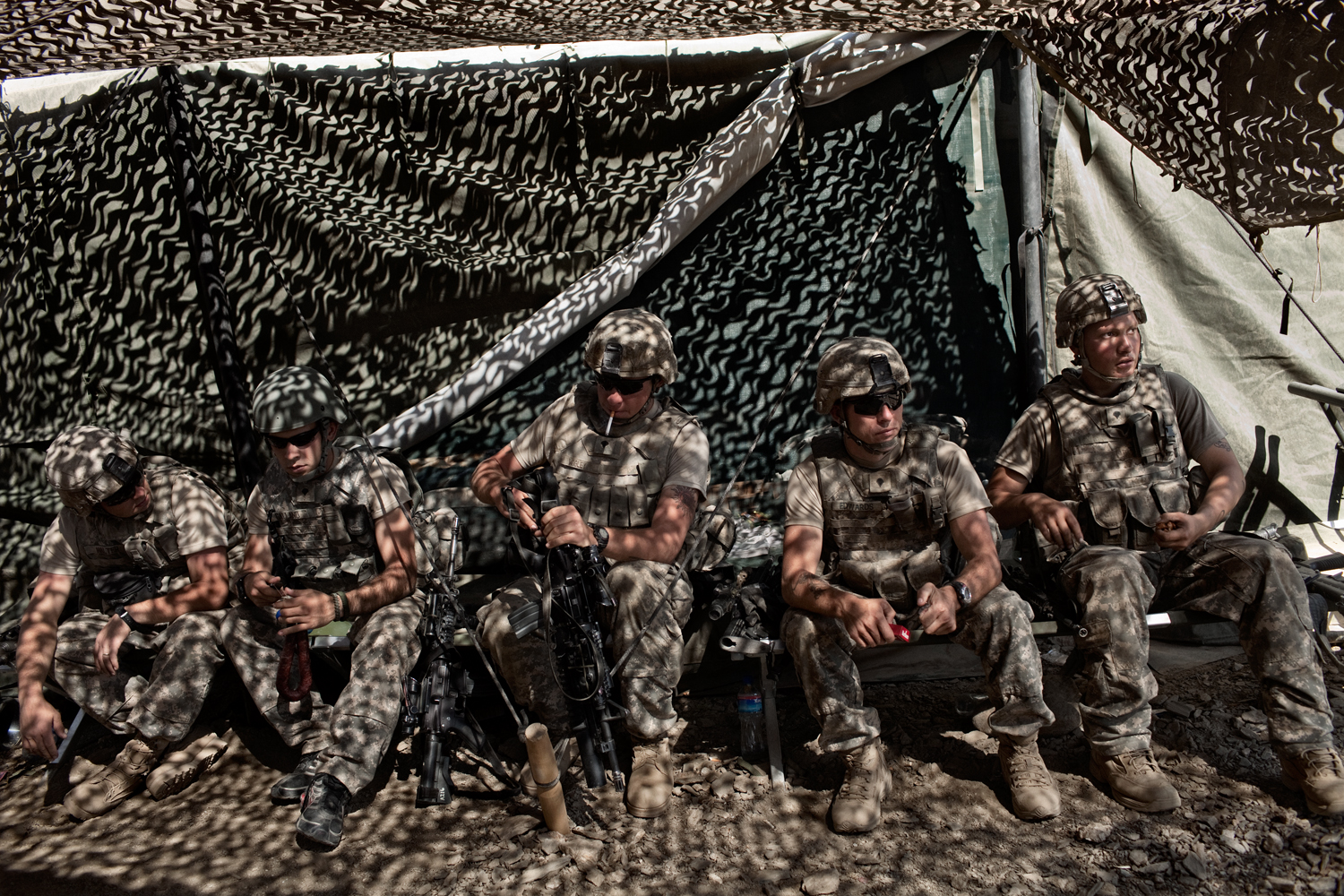  U.S. Army soldiers stand down at Combat Operations Post Tangi after it came under rocket attack in the Tangi Valley, Wardak Province, Afghanistan.    