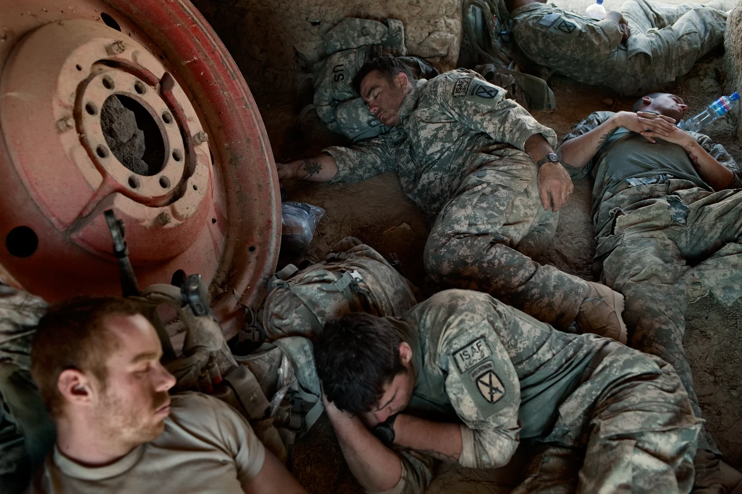 U.S. Army soldiers sleep at a temporary patrol base during an operation in the Tangi Valley, Wardak Province, Afghanistan.