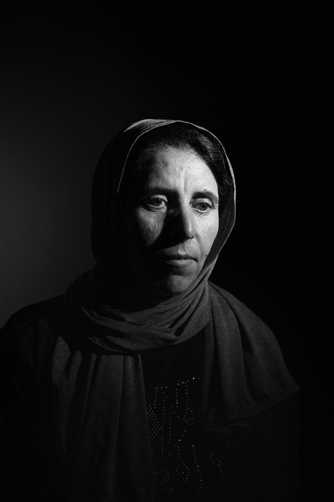  Amina Ammu is 46. She was held captive by ISIS with her two children and a nephew. Iraq, 2019. 