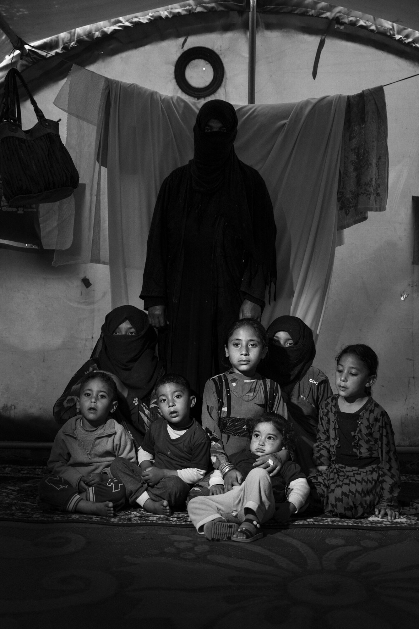  A mother with her seven children in Salamiya camp, Iraq, 2019. 