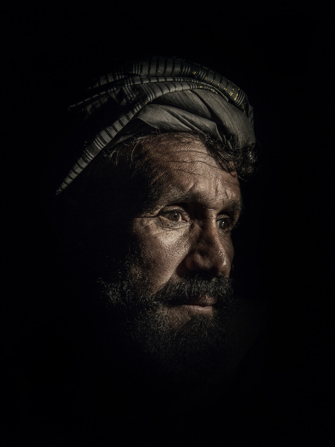  Sher Muhammad, age 40, from Helmand Province. He moved to an IDP camp in Kabul in 2009 after fighting affected his ability to farm, Afghanistan, 2016. 